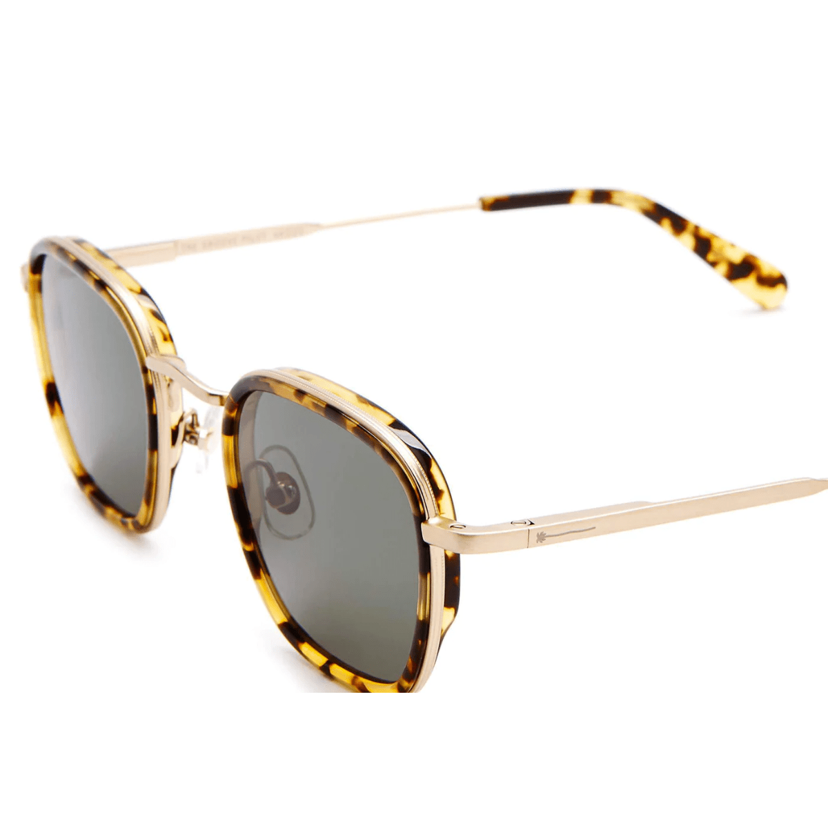 Rounded square sunglasses with tortoiseshell acetate frame, brushed gold metal temples, and dark gray lenses.