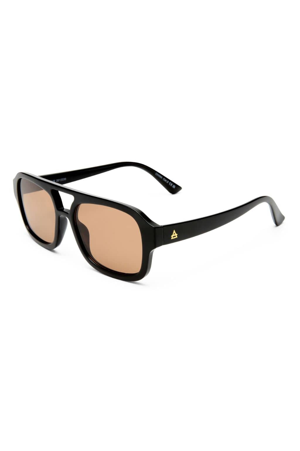 Black square sunglasses with brown-tinted lenses and gold accent on temple.