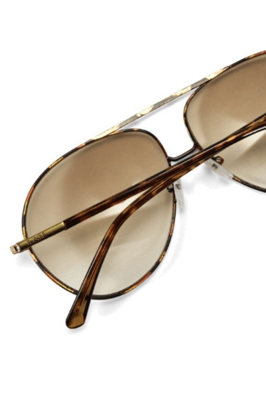 Havana tortoiseshell oval sunglasses with beige tinted lenses and brown acetate frames.