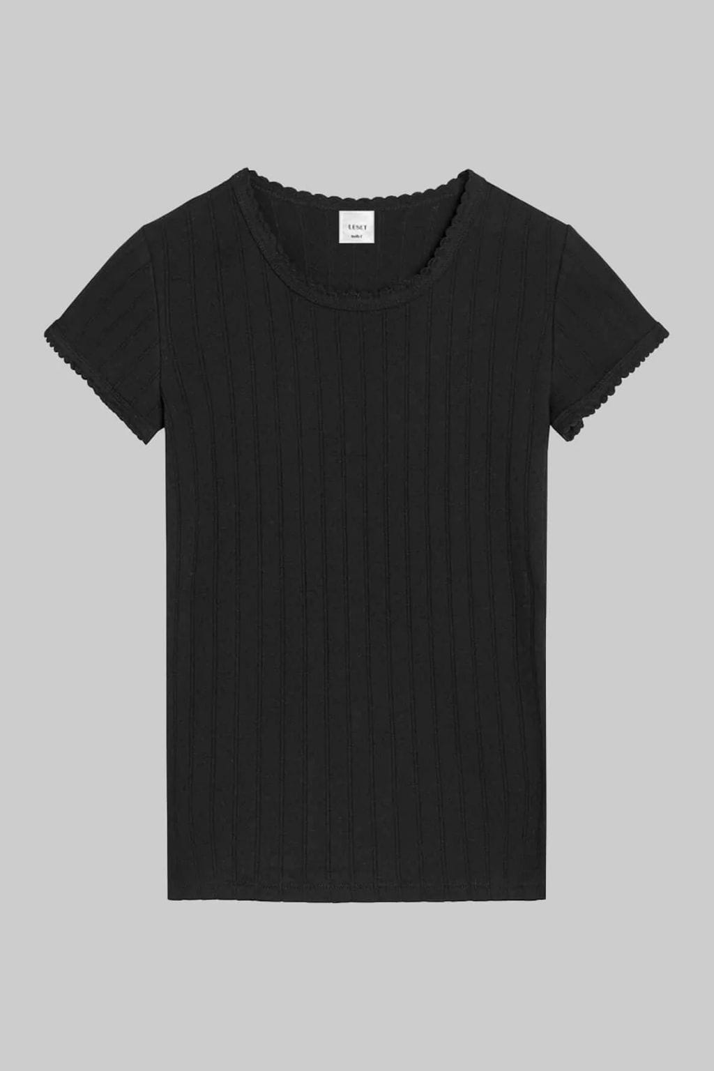 Black slim fit t-shirt with vertical pointelle knit texture and scalloped crew neckline and short sleeves.