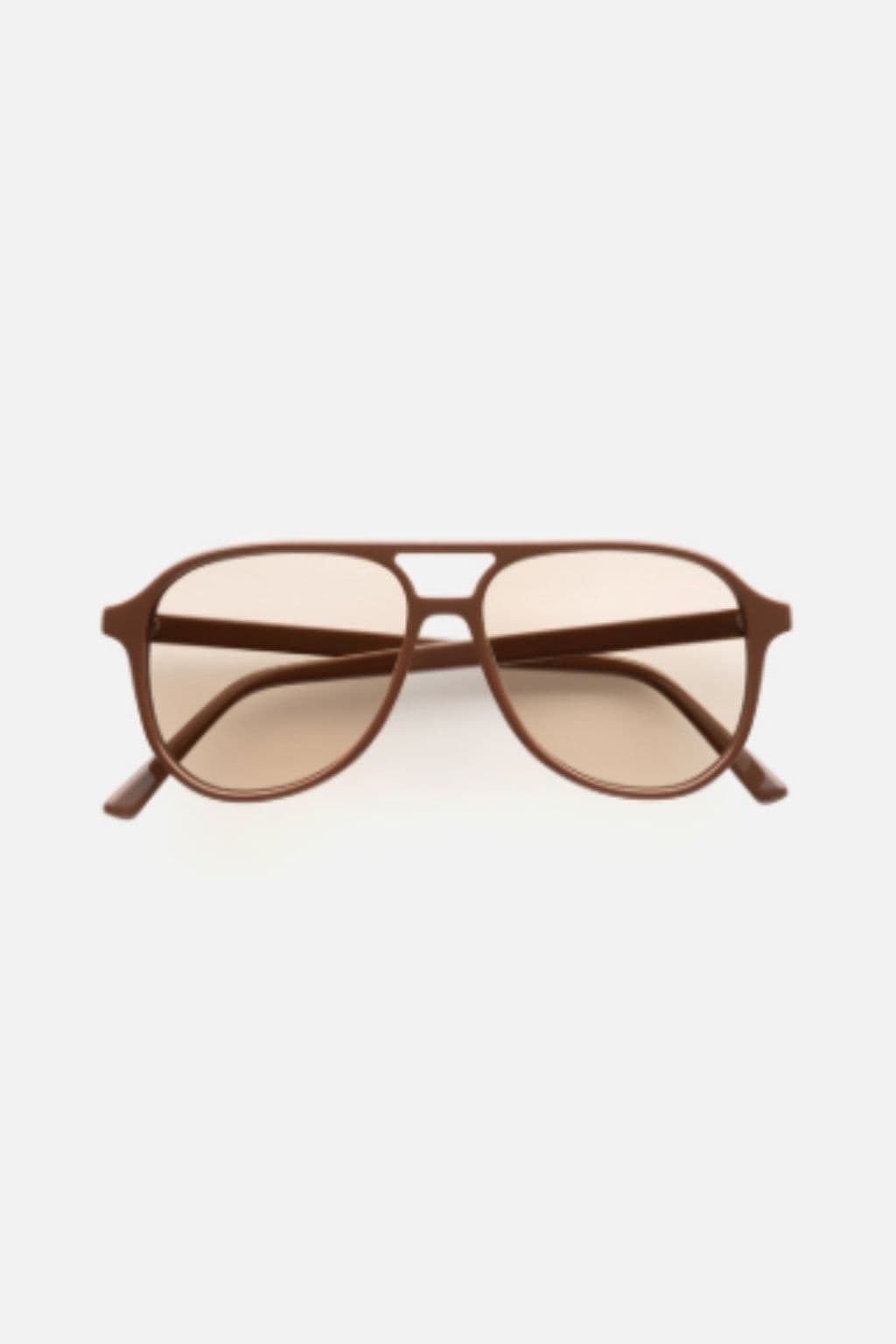 Cinnamon-brown aviator sunglasses with light tinted lenses and curved temples, displayed front-facing.
