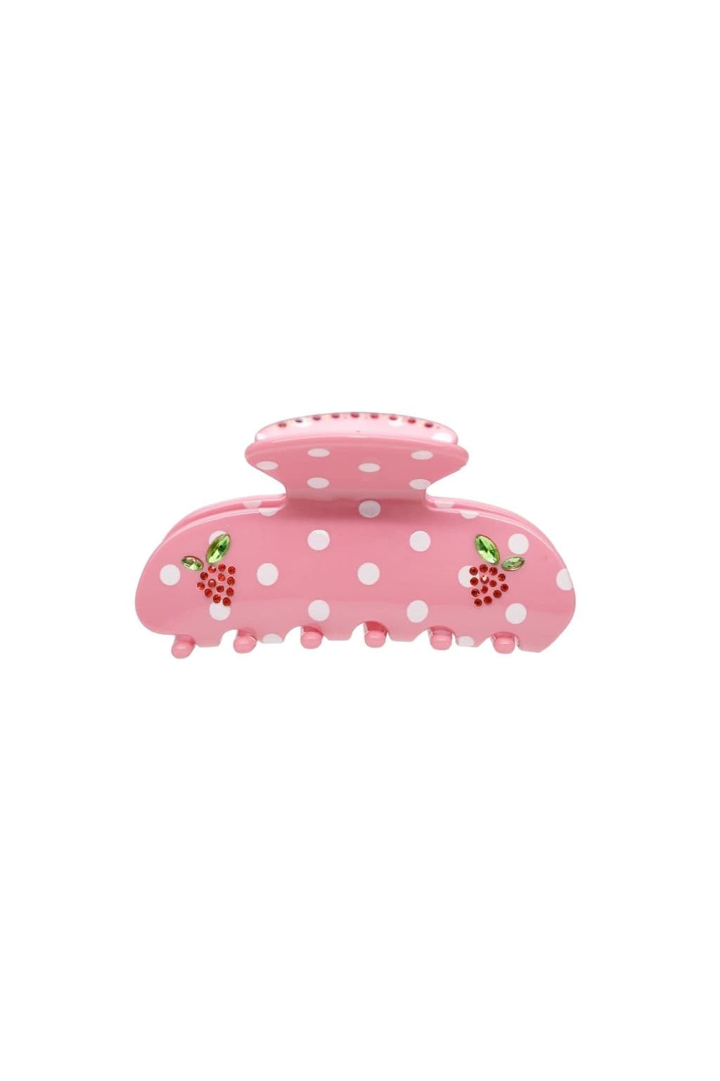 Pink hair clip with white polka dots and red berry embellishments with green leaves on sides.
