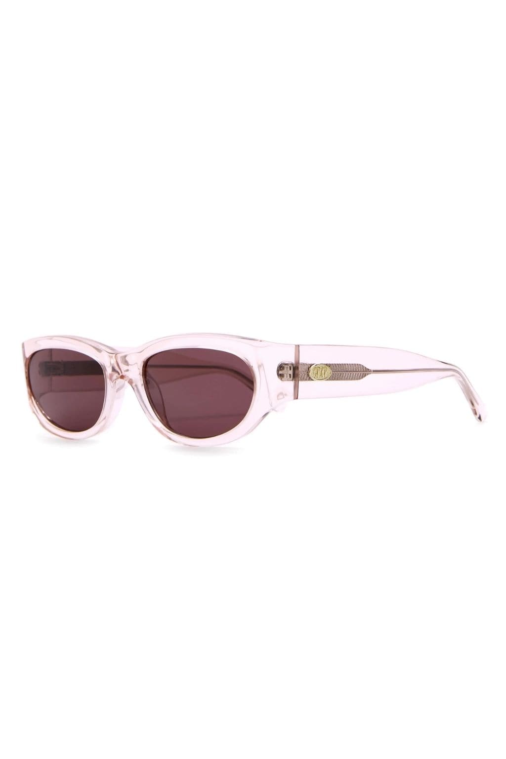 Crystal rose pink oval sunglasses with dark plum lenses and gold-tone hardware details.