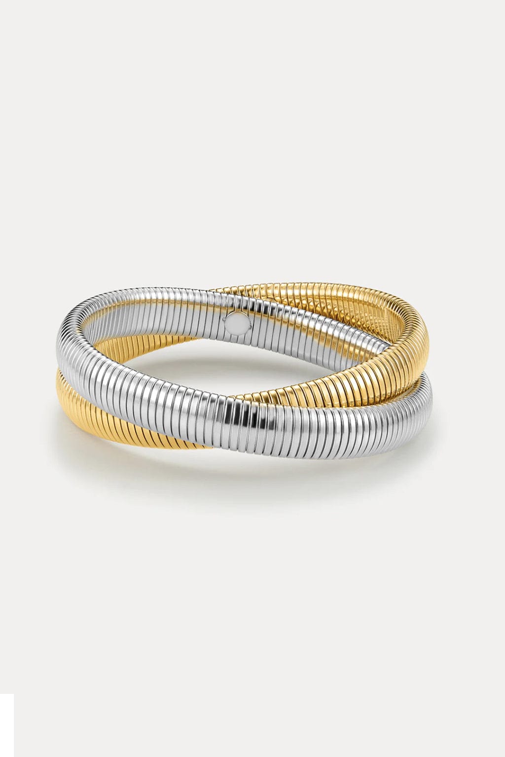 Two-tone gold and silver flexible snake chain bracelet with intertwined bands and a clasp closure.