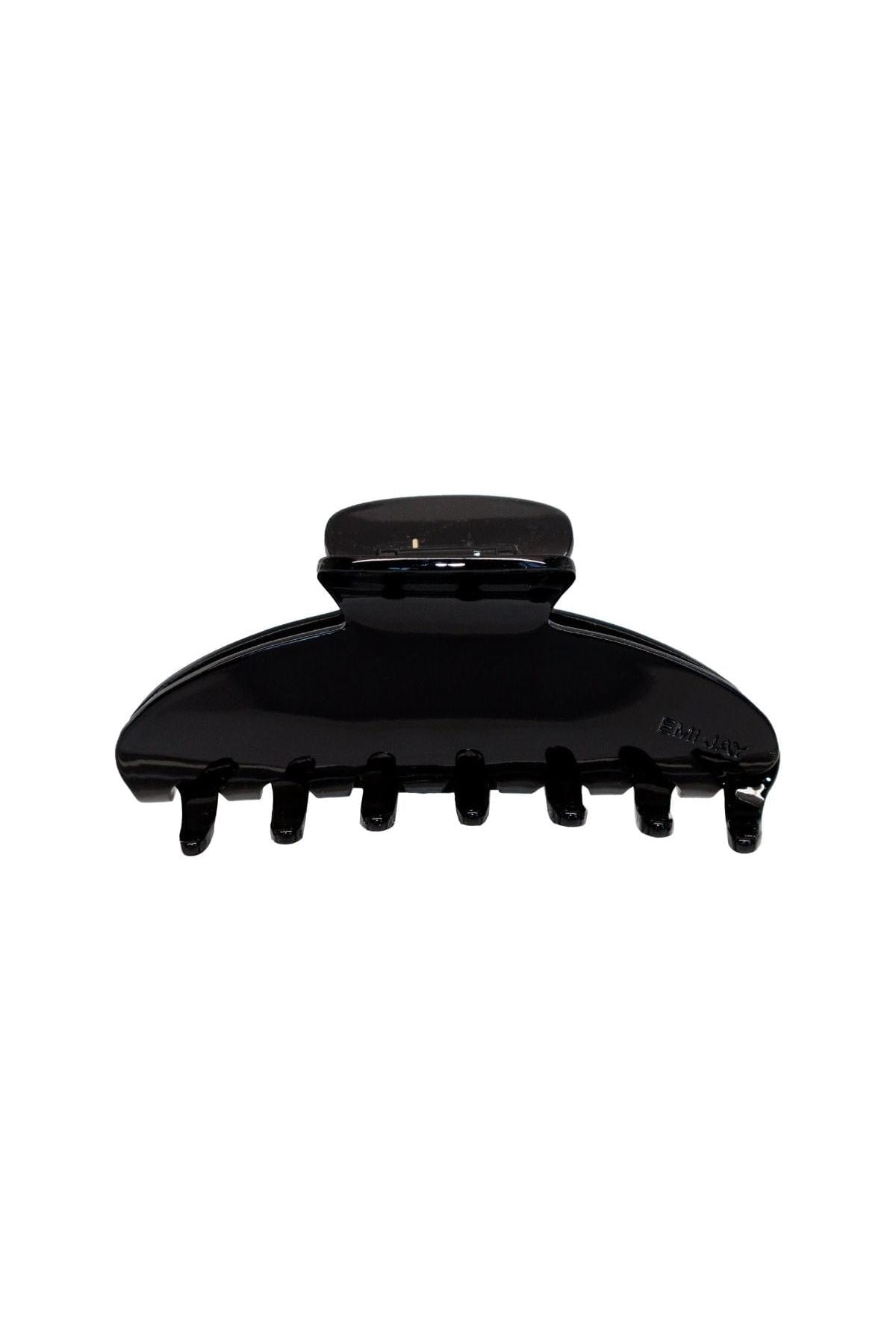 Large black claw clip with textured grip and multiple teeth for holding hair.