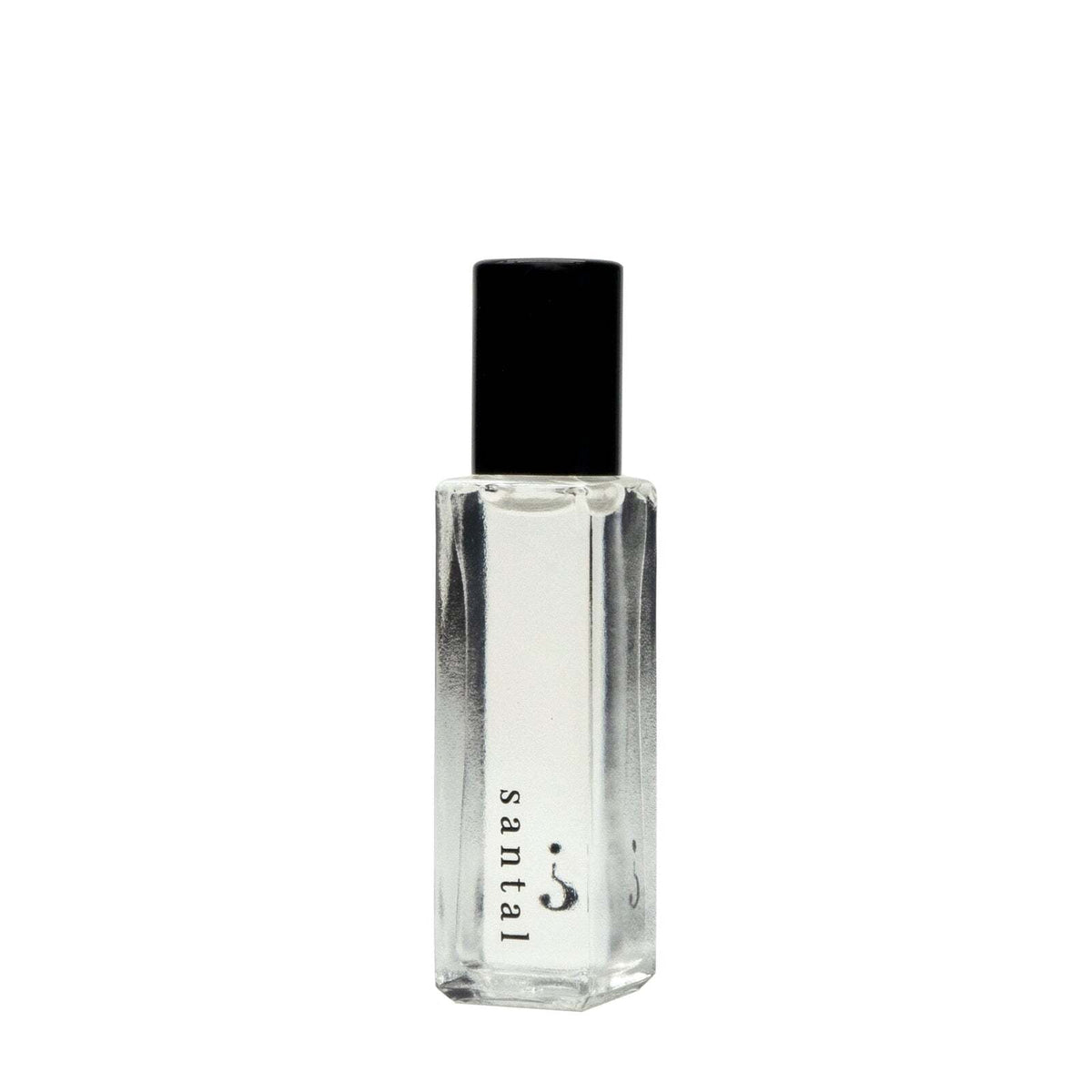 Clear glass roll-on bottle with black cap containing santal oil, labeled on front.