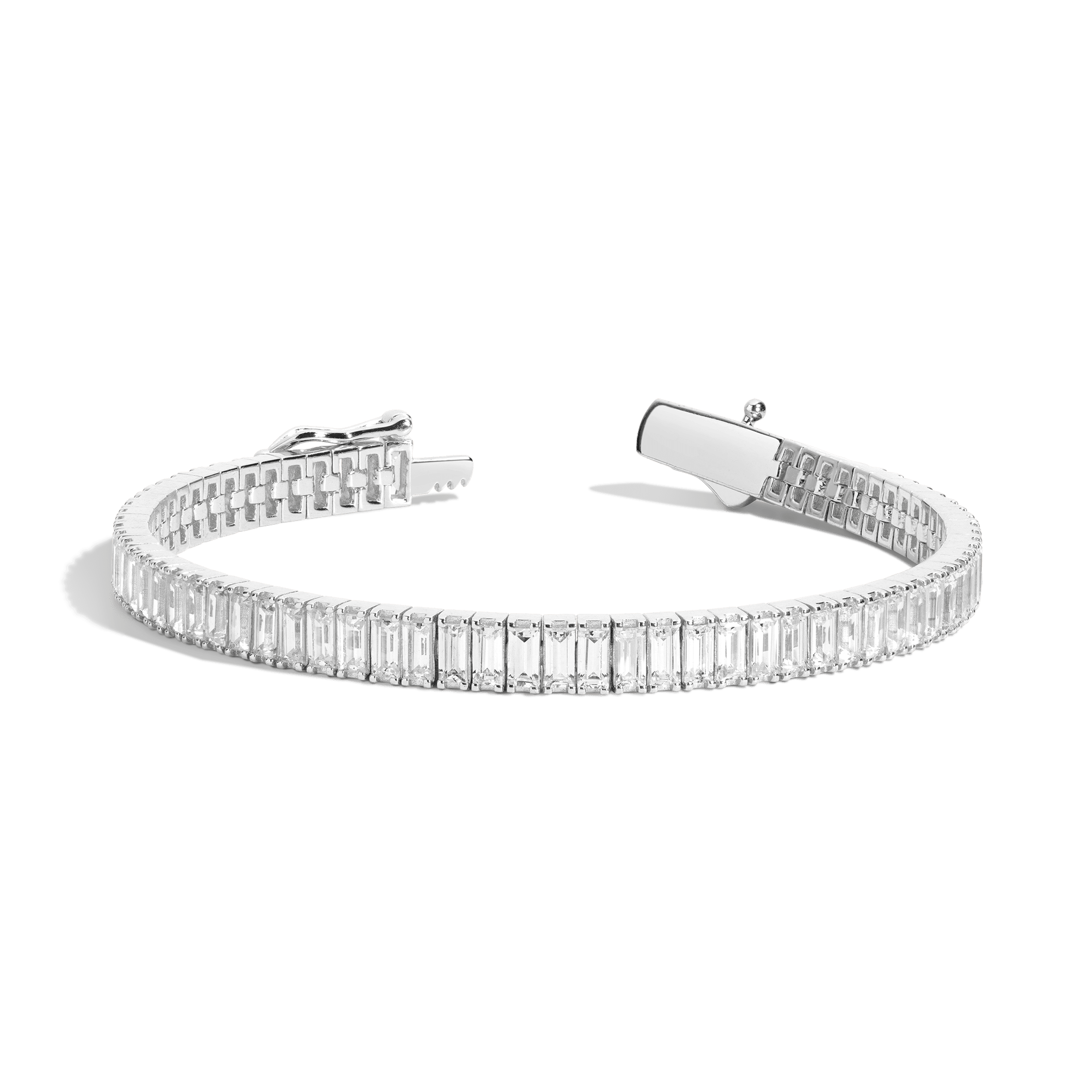 Silver tennis bracelet featuring rectangular baguette-cut white stones set in a continuous line with a clasp closure.