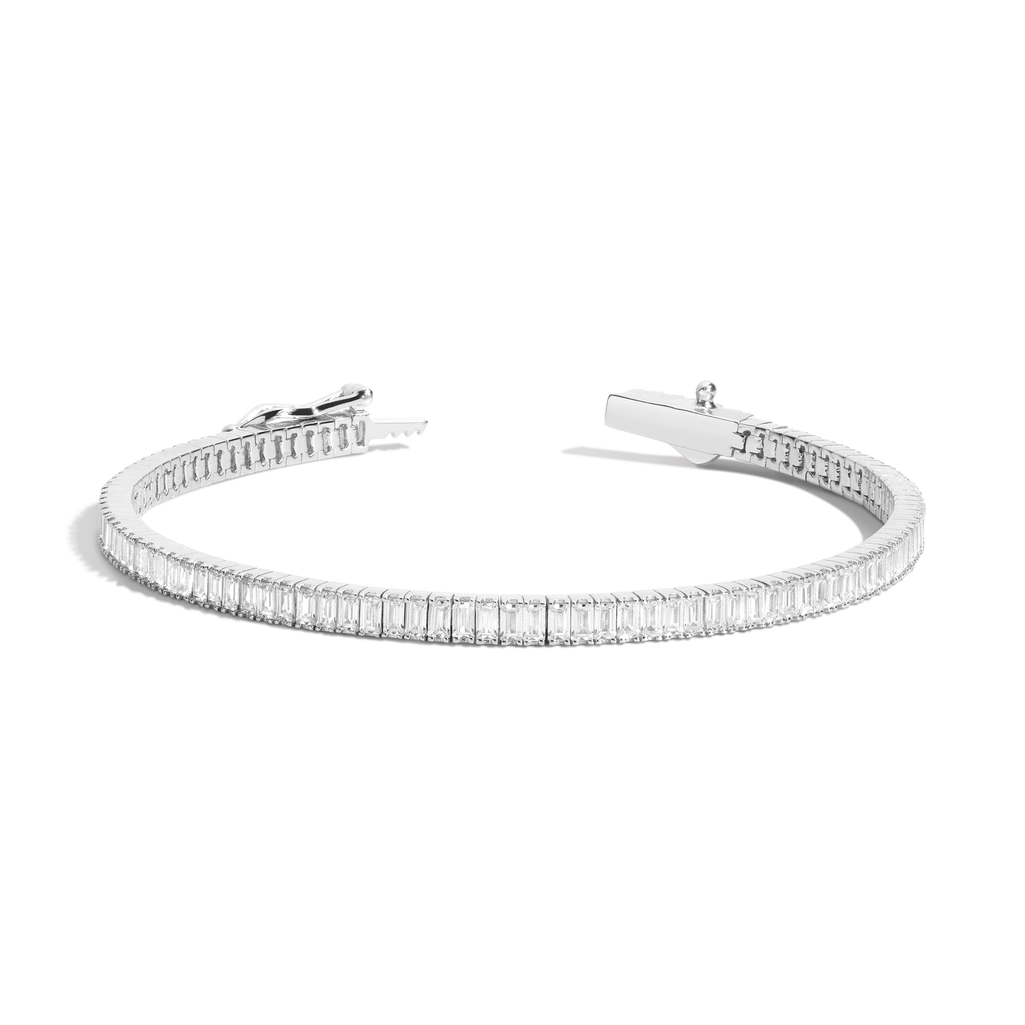 Silver tennis bracelet with rectangular white gemstones set in a continuous row, displayed open against white background.
