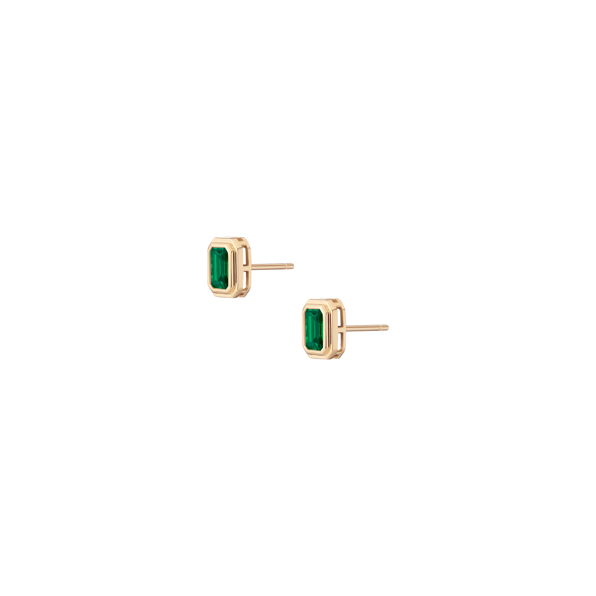Pair of gold stud earrings with rectangular green emerald stones set in bezel settings.