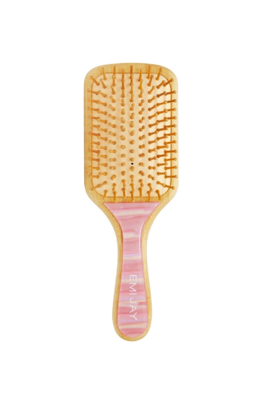 Bamboo paddle brush with wooden bristles and pink striped handle.
