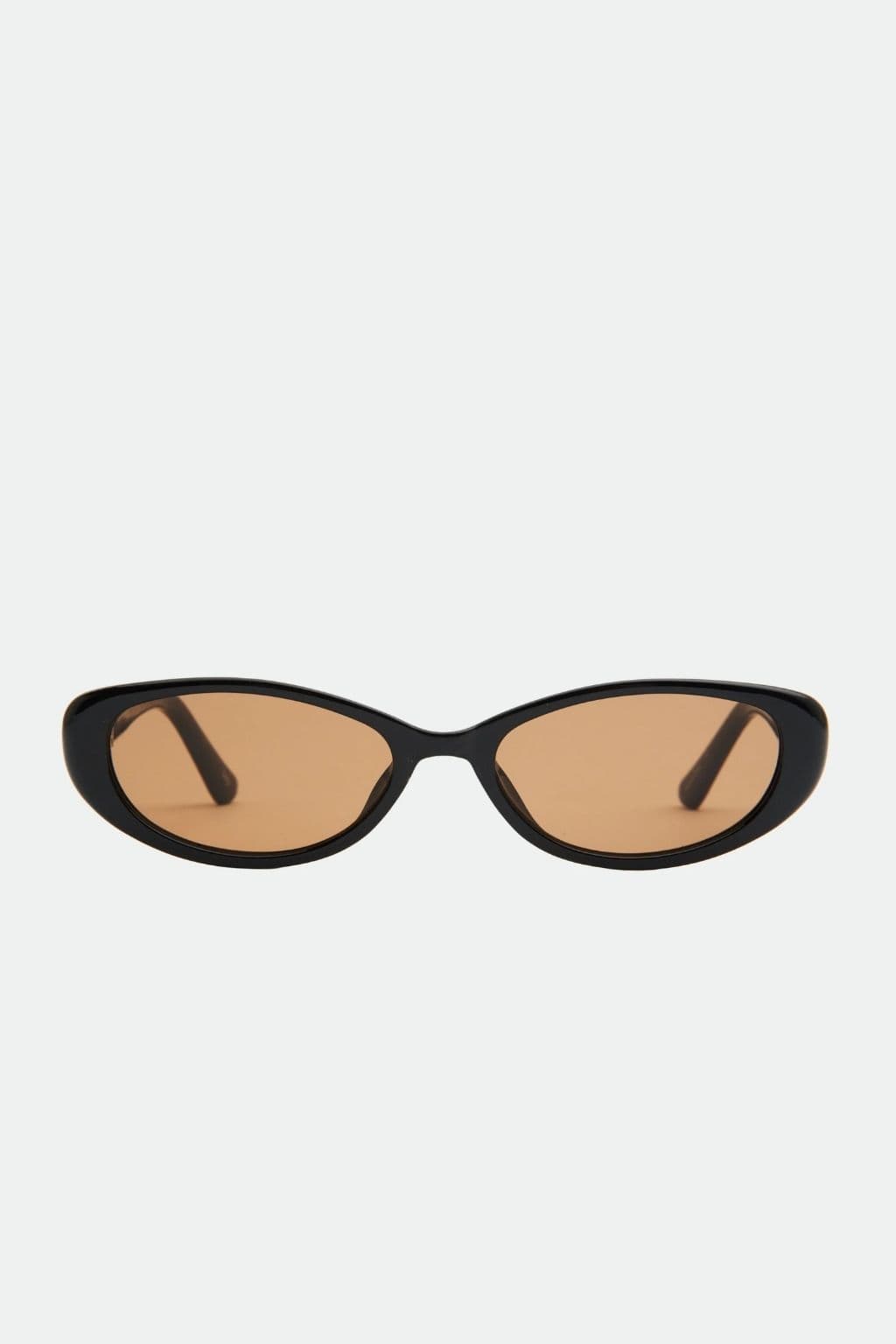 Black oval sunglasses with brown tinted lenses and dark brown arms.