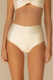 Cream high-rise bikini bottom with wide waistband, shown on model from waist to mid-thigh.