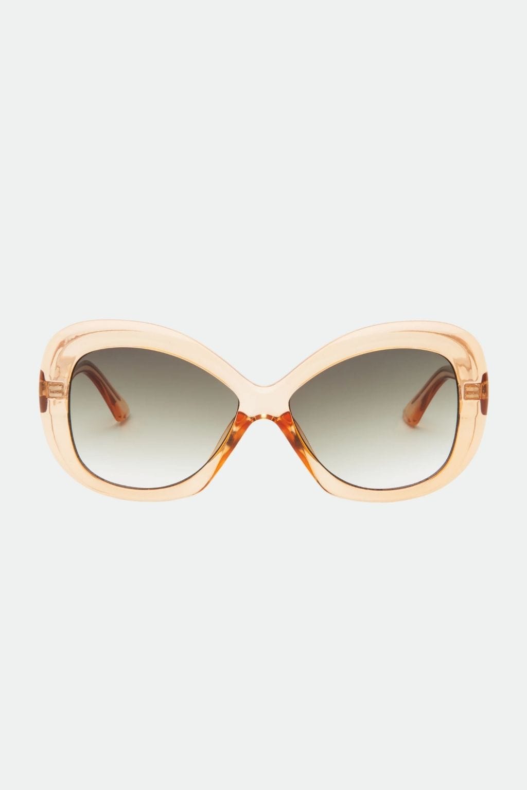 Oversized square sunglasses with translucent peach frames, tortoiseshell bridge, and gradient gray lenses.