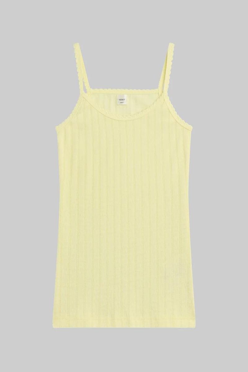 Yellow pointelle tank top with thin vertical ribbed texture and adjustable straps.