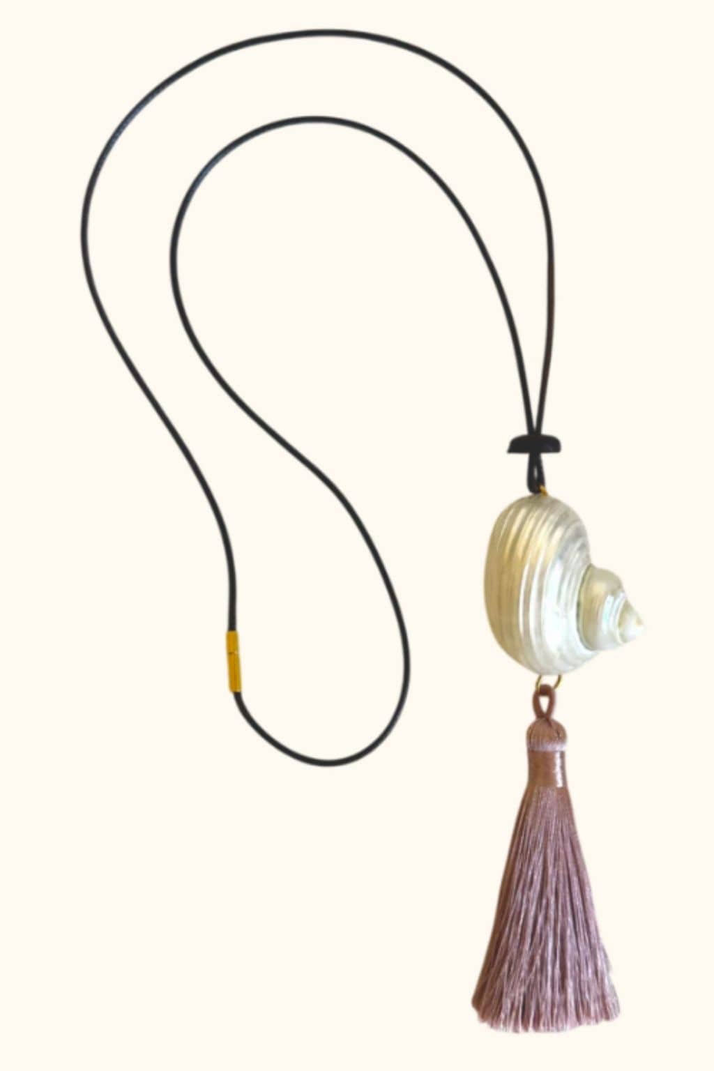 Black cord necklace with cream and white striped bead pendant and brown tassel charm.