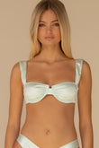 Seafoam silkie bikini top with ruched cup detail and wide shoulder straps on model.