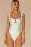Seafoam silkie one-piece swimsuit with sweetheart neckline and cutout detail, shown on model.