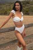 White textured bikini bottom with high-waisted fit and side tie details.