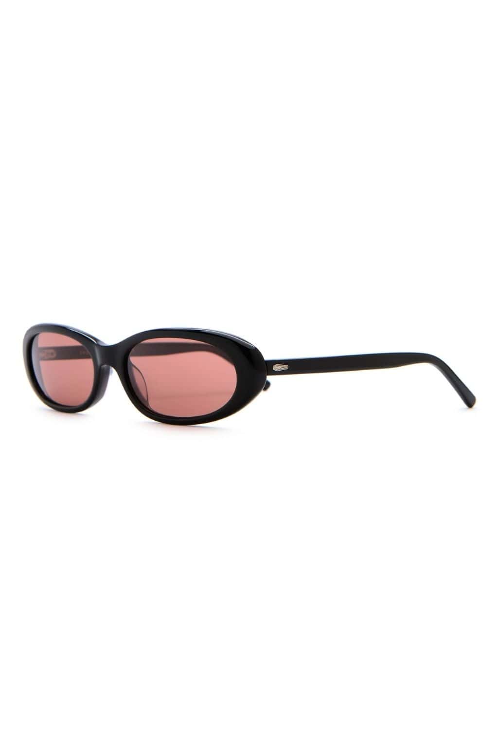 Black oval sunglasses with pink-tinted lenses and black arms.