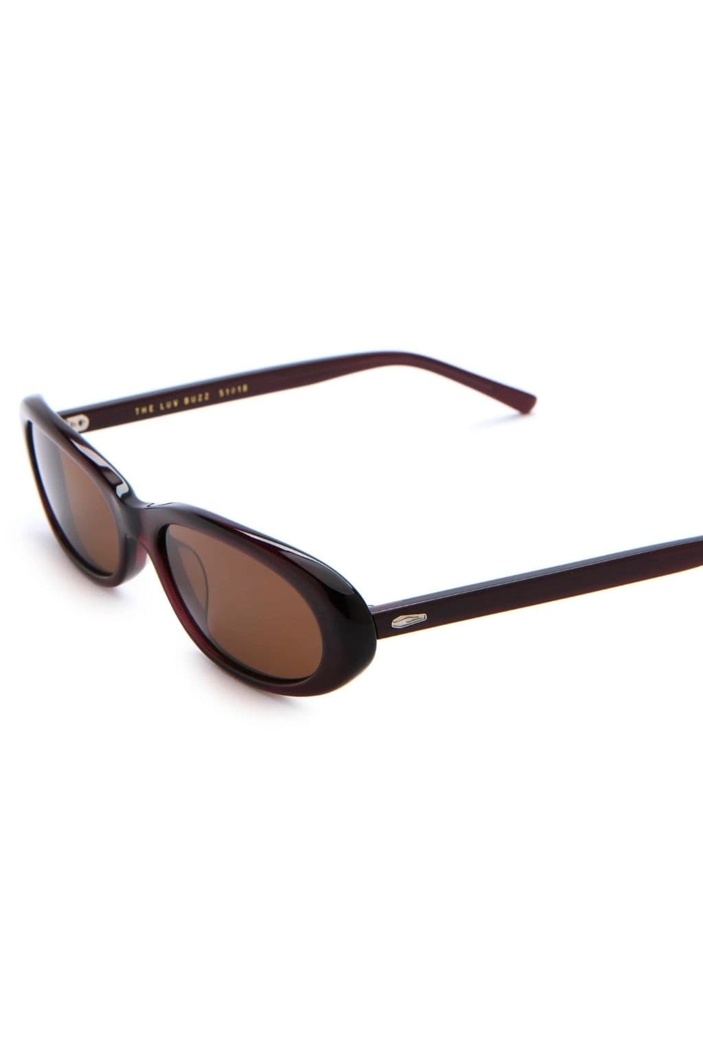 Dark plum oval sunglasses with brown tinted lenses and gold hardware accents on the frames.