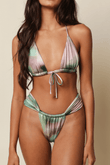 Triangle bikini top with tie closure in pink, green and white ombre dye pattern.