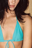 Teal triangle bikini top with tie closure at center front and neck straps.